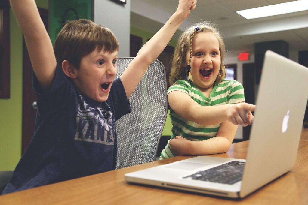 Two children and laptop