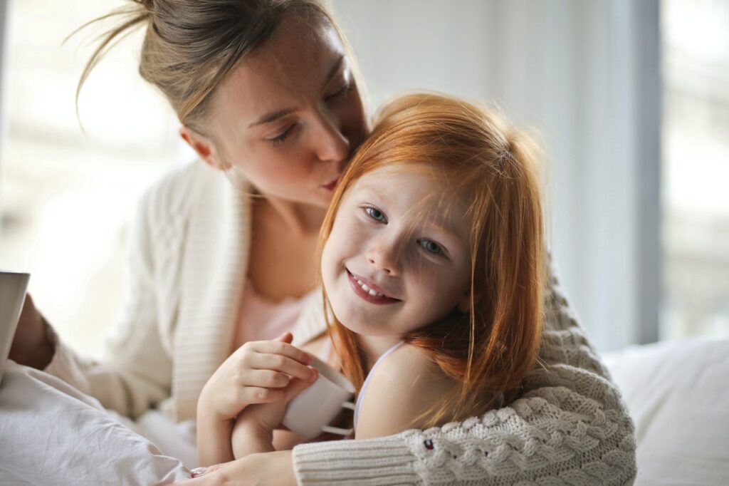 Mother holding young child