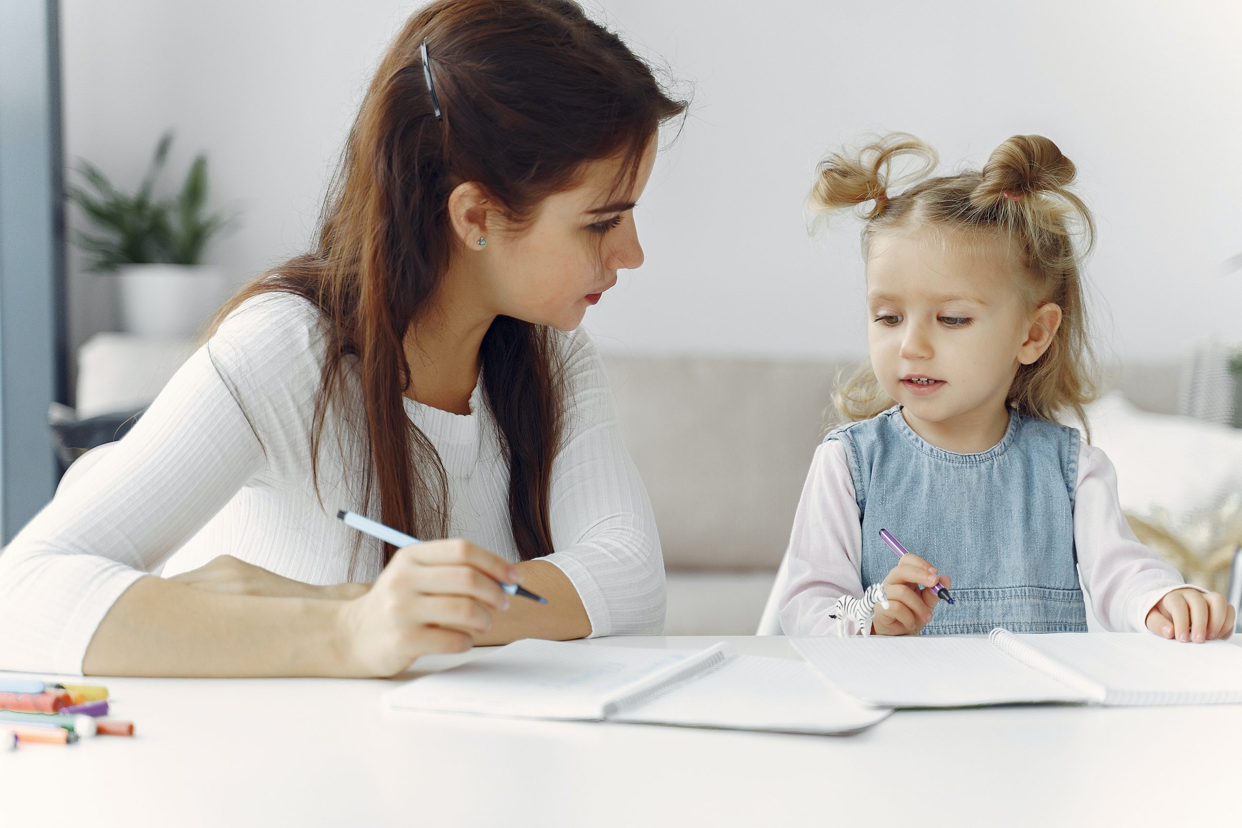 Adult and child drawing