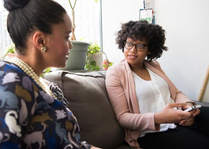 Two women talking