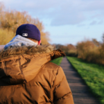 Young person walking along path