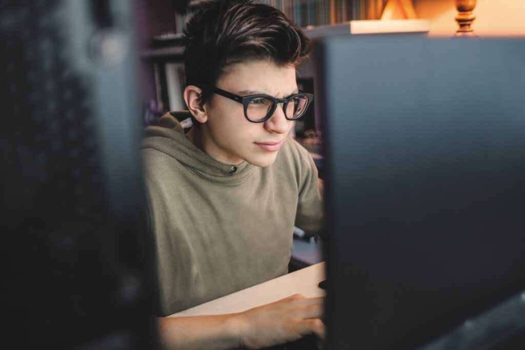 Young person and computer