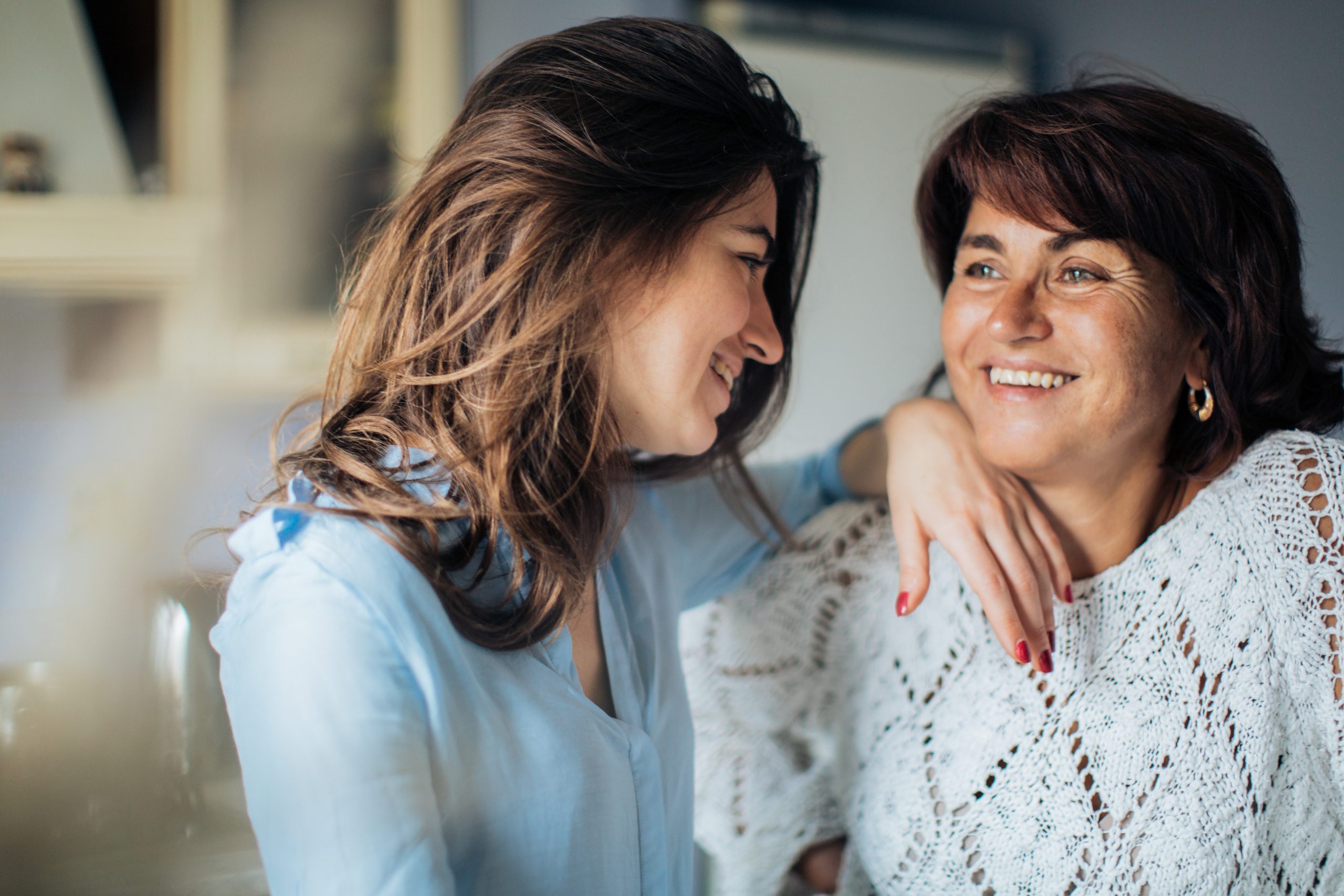 Two women smiling