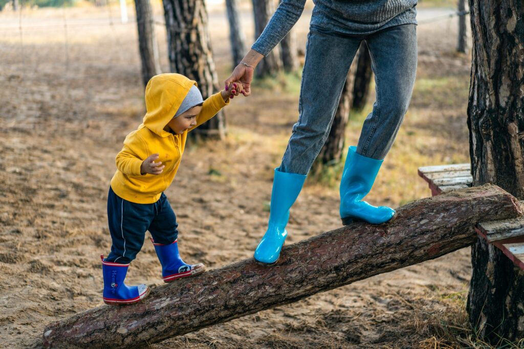 Woman and child climbing