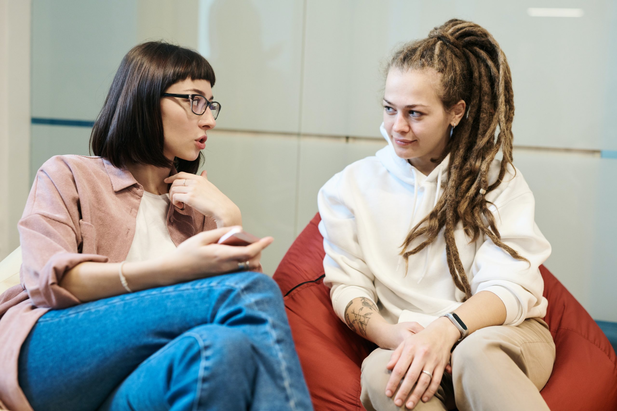 Woman talking to young person