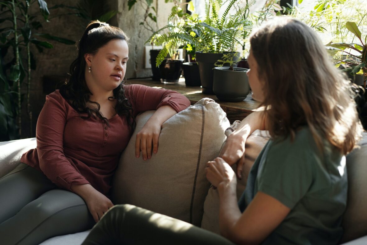 Two women sitting and talking