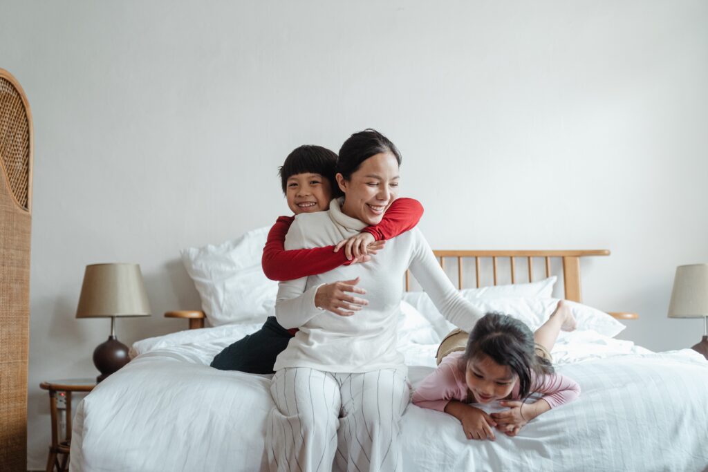 Family of three playing