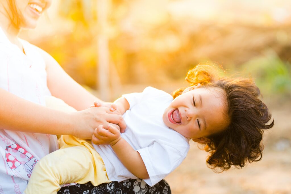 Child playing with parent