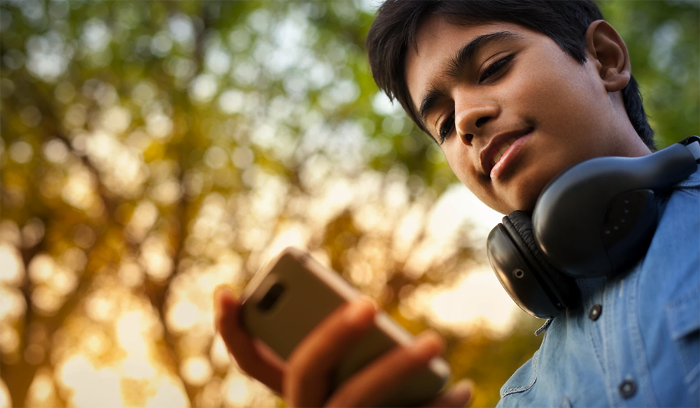 Young person with mobile phone