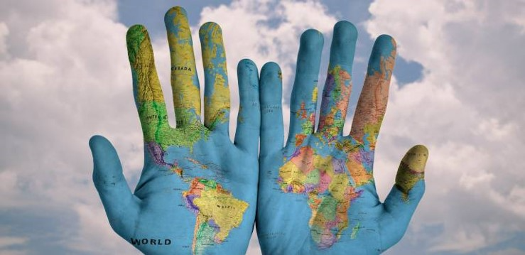 A picture containing text, handwear, clothing
Description automatically generated