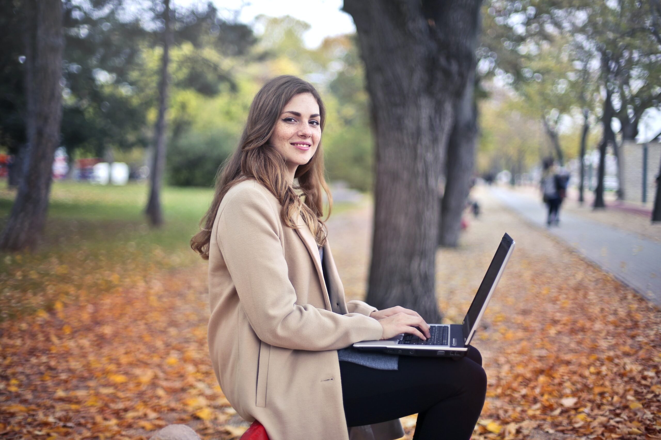 Young adult outside in park