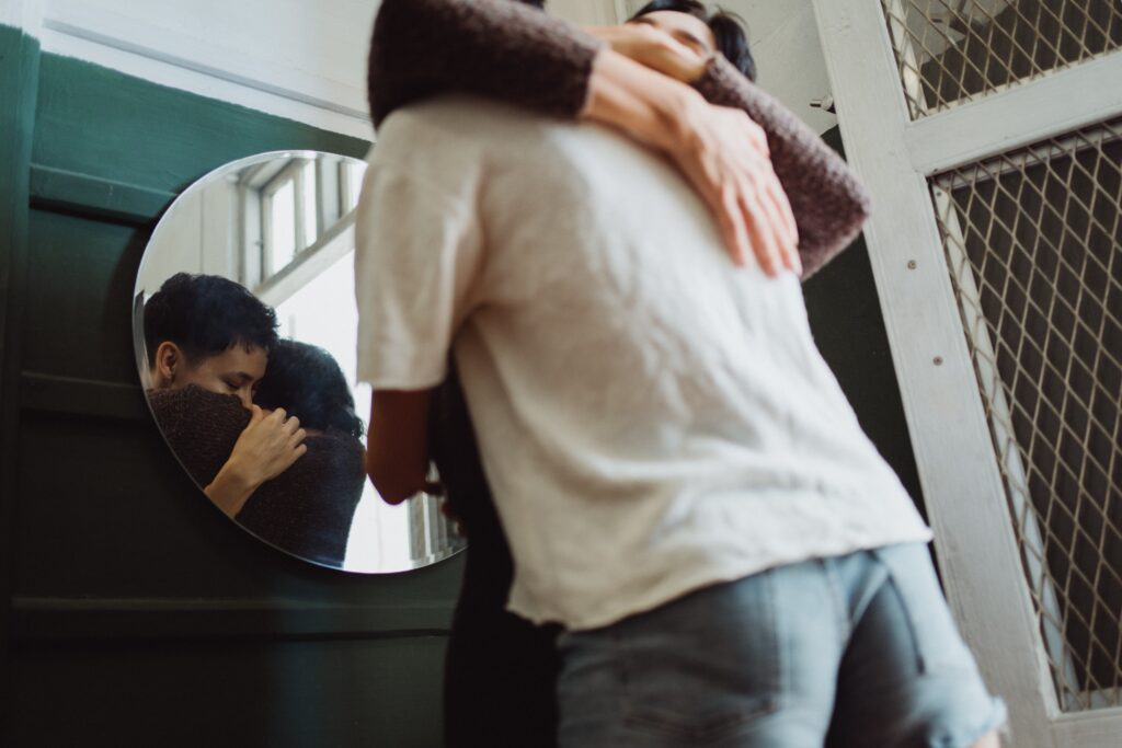 Two people hugging