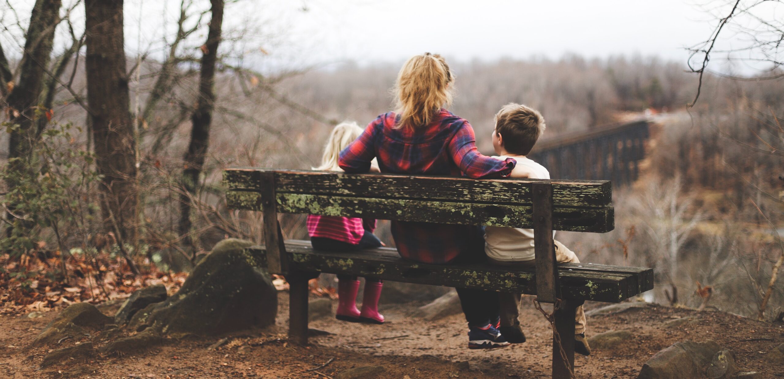 Women sitting with children