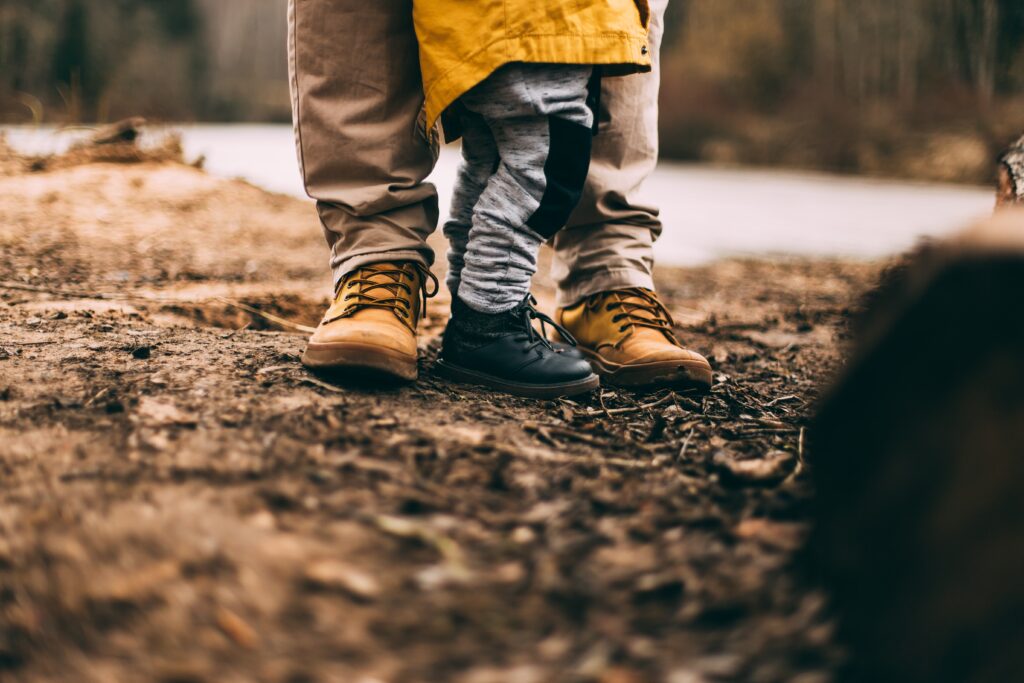 Adult and young child outside