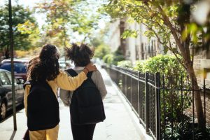 Two young women walking