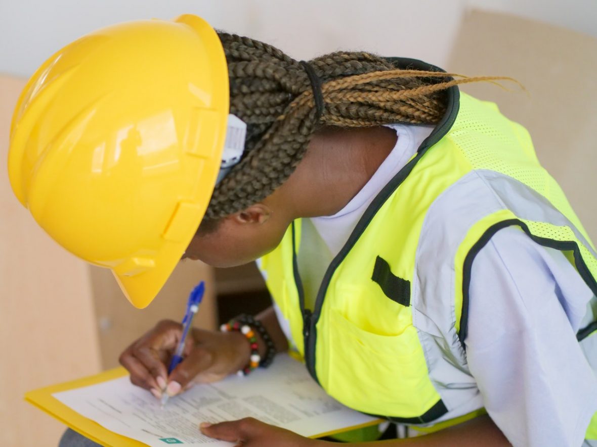 Young woman in construction