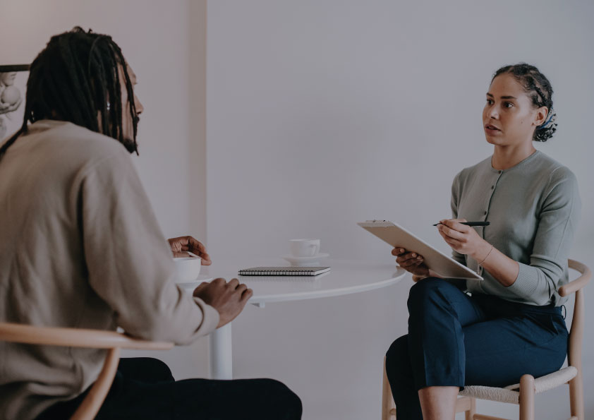 Two people in a meeting