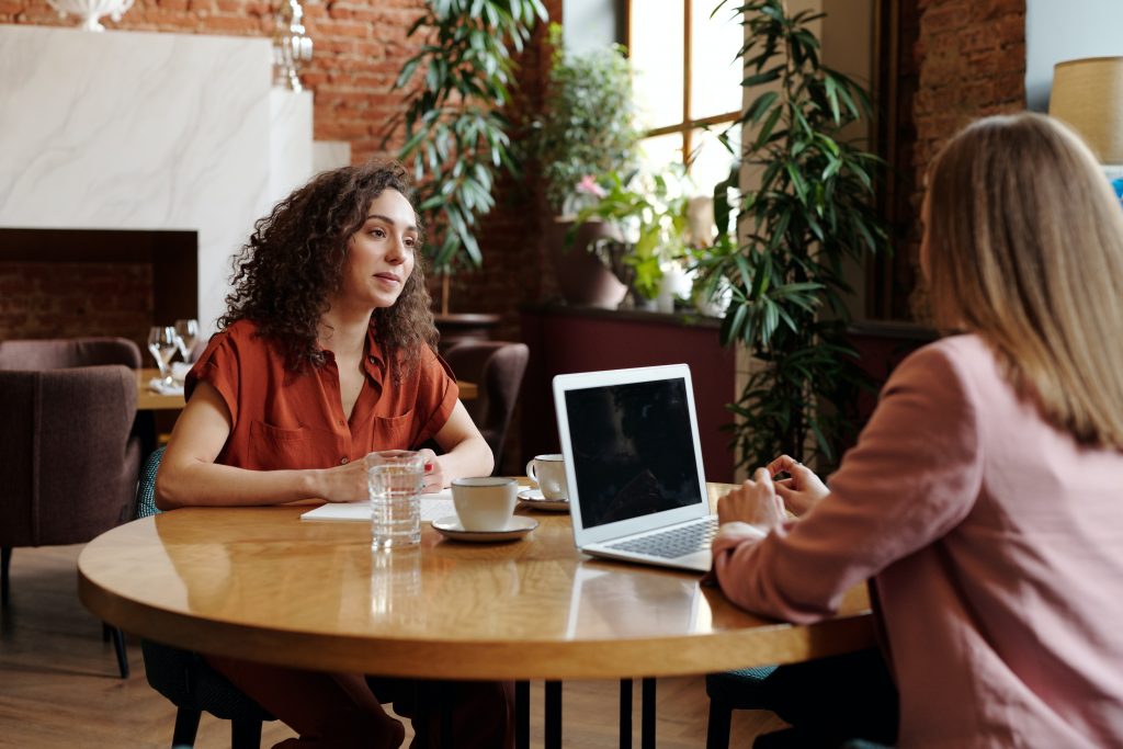 Woman in a meeting with laptop