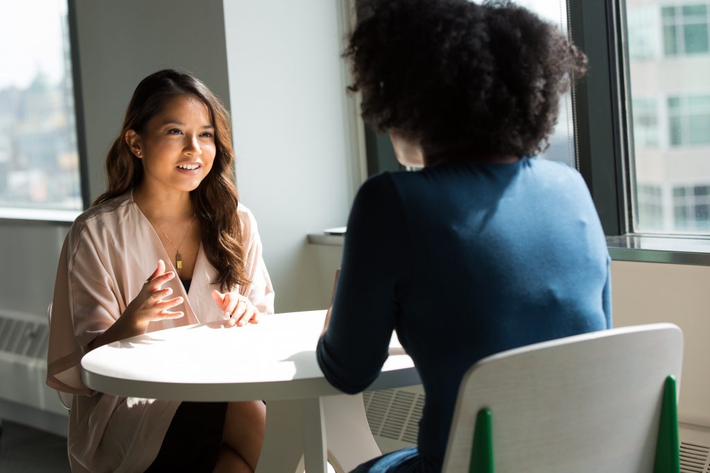 Two women talking