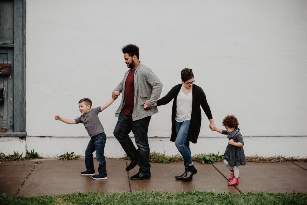 A family holding hands