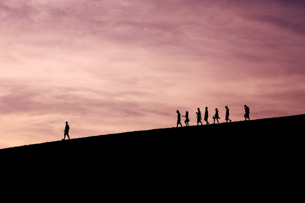 People walking on a hill