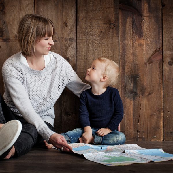 Woman and child reading a map