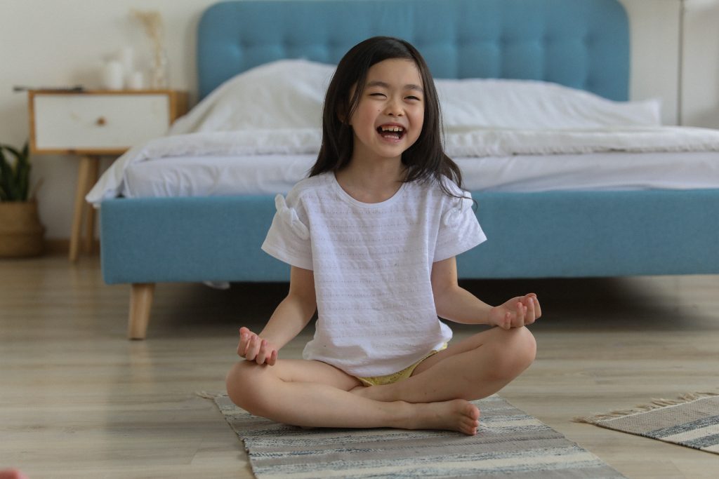 Child in a meditation pose