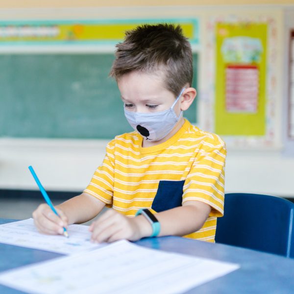 Child with a face mask